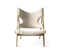 Audo Copenhagen Butaca Lounge Knitting Piel de oveja nature. base de roble natural
