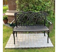 Banca de jardín "April" en bronce envejecido, sin cojín de asiento. Fabricada en aluminio fundido en arena, resistente a la intemperie, inoxidable y de bajo mantenimiento.