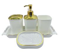 Conjunto de accesorios para baño que incluye dispensador de jabón y estante de almacenamiento