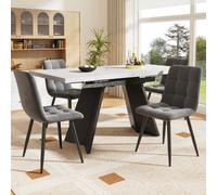 Conjunto de comedor Flieks, de 5 piezas, con mesa rectangular extensible con aspecto de mármol, y 4 sillas de comedor. Las sillas son tapizadas en terciopelo, la mesa es blanca y las sillas son grises