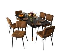 Conjunto de mesa de comedor extensible con 6 sillas tapizadas en efecto cuero, estructura metálica negra y diseño moderno industrial, perfecto para salón o cocina familiar