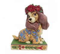 Enesco - Figura coleccionable Lady Christmas Disney Traditions de Jim Shore modelo 6010876, en poliresina y carbonato de calcio con relieve detallado, corona de acebo y motivos rosemaling, ideal para