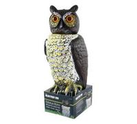 Estatua buho ahuyenta palomas