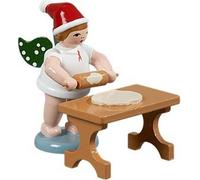Figura de madera de un ángel panadero, con un rodillo de masa sobre la mesa y una corona. Altura: 6 cm. Producto nuevo