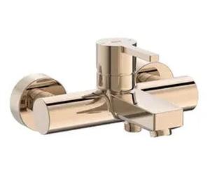 Grifo de baño monomando de diseño circular con acabado en oro rosado de Naia Roca