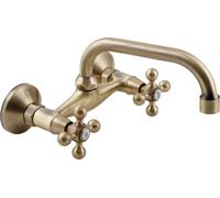 Grifo de pared para lavabo/fregadero Stilo, caño curvo, color latón envejecido