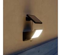 Lámpara de pared LED solar Philips Fyns, negra, con sensor, IP44