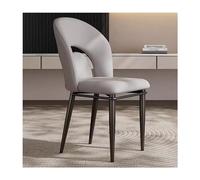 Modernas sillas de comedor tapizadas de piel sintética con respaldo curvado y patas de metal negro, elegantes sillas decorativas para cocina y sala de estar, perfectas para decoración contemporánea