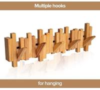 Perchero de pared Unyqoos® fabricado con madera 100% natural, con 5 ganchos plegables, diseño innovador y color marrón claro