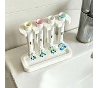 Shein 1 pieza Soporte de almacenamiento para cabezal de cepillo de dientes eléctrico, soporte universal de 4 ranuras para drenaje de cabezal de cepillo, bas