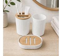 Shein Este juego de 3 piezas de accesorios de baño con rayas verticales puede renovar la encimera de tu baño. El juego incluye un soporte para cepillo de di