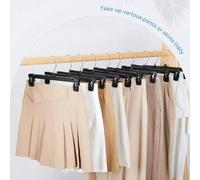Shein Perchas de ropa de plástico negro con 2 clips antioxidantes ajustables para colgar faldas y 1 gancho giratorio 360° para pantalones y vaqueros. Set de