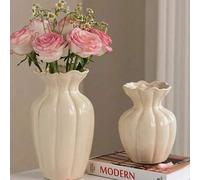 Shein Un jarrón de resina elegante con estilo vintage. Se puede usar como un contenedor para flores de sala de estar, una decoración moderna en un estante d
