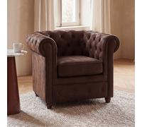 Sillón capitoné tapizado de antelina marrón