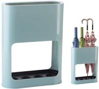 Soporte para paraguas Unyqoos®: elegante, compacto y funcional, en color azul profundo, fabricado en plástico ABS con placa de acero. Cuenta con 4 compartimentos para guardar los paraguas y un recipie