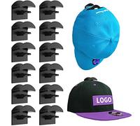 Towviy Colgador de Sombreros 12pcs, ABS Ganchos Autoadhesivos para Gorras sin Perforación, Organizador de Sombrero Colgador para Pared, Ideal para Hogar y Tiendas