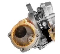 Turbocompresor, fabricado en acero de alta calidad, con las siguientes dimensiones: 29 cm de largo, 27 cm de ancho y 23 cm de alto, y un peso de 7220 gramos