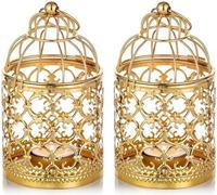 Unyqoos® Linterna colgante para velas, diseño de jaula de pájaros, metal, color dorado envejecido, juego de 2 unidades – centros de mesa decorativos para bodas, fiestas y exteriores