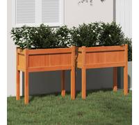 vidaXL Jardineras con patas 2 uds madera maciza de pino marrón cera